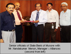 Senior Officials of State Bank of Mysore with Mr. Nandakumar Menon, Manager - Alliances (second from left) Senior Officials of State Bank of Mysore with Mr. Nandakumar Menon, Manager - Alliances (second from left)